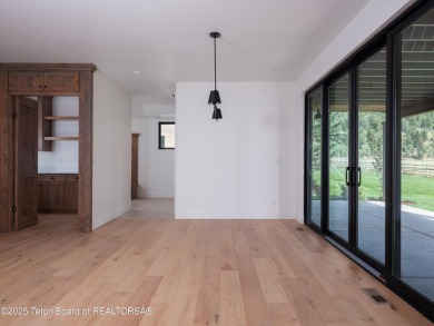This brand-new custom home in Teton Reserve feels like a private on Teton Reserve in Idaho - for sale on GolfHomes.com, golf home, golf lot