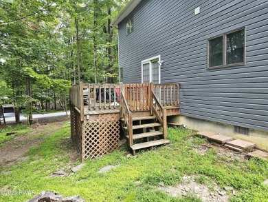 Live the Lake Lifestyle in Prestigious Tanglwood Lakes- Fully on Paupack Hills Golf and Country Club in Pennsylvania - for sale on GolfHomes.com, golf home, golf lot