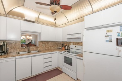 GOLFERS THIS IS THE PERFECT LOCATION FOR YOU, THIS IS AN AMAZING on Wynmoor Golf Course in Florida - for sale on GolfHomes.com, golf home, golf lot