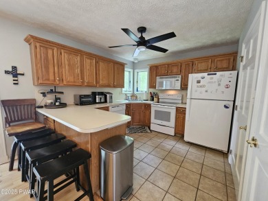 Live the Lake Lifestyle in Prestigious Tanglwood Lakes- Fully on Paupack Hills Golf and Country Club in Pennsylvania - for sale on GolfHomes.com, golf home, golf lot