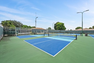 Renovated,price improved, and ready for quick move-in. Looking on Atlantis Golf Club in Florida - for sale on GolfHomes.com, golf home, golf lot