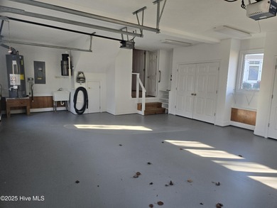 This elegant ranch-style residence offers panoramic views of on Ocean Ridge Plantation in North Carolina - for sale on GolfHomes.com, golf home, golf lot