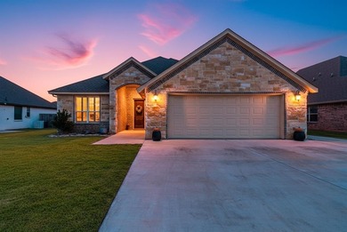 Welcome home to this beautifully designed newer-built property on Legends Country Club in Texas - for sale on GolfHomes.com, golf home, golf lot