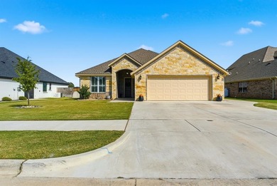 Welcome home to this beautifully designed newer-built property on Legends Country Club in Texas - for sale on GolfHomes.com, golf home, golf lot
