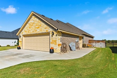 Welcome home to this beautifully designed newer-built property on Legends Country Club in Texas - for sale on GolfHomes.com, golf home, golf lot