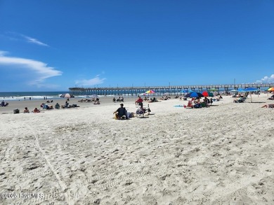 This elegant ranch-style residence offers panoramic views of on Ocean Ridge Plantation in North Carolina - for sale on GolfHomes.com, golf home, golf lot