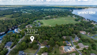 Surrounded by mature trees on a peaceful lot, this home blends on The Coves Golf Course in Oklahoma - for sale on GolfHomes.com, golf home, golf lot