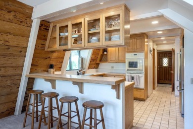 This lovely mountain home in Olympic Valley offers a main house on  in California - for sale on GolfHomes.com, golf home, golf lot