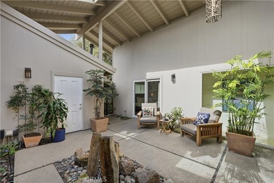 Tucked behind gates in the prestigious Virginia Country Club on Virginia Country Club in California - for sale on GolfHomes.com, golf home, golf lot