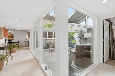 Tucked behind gates in the prestigious Virginia Country Club on Virginia Country Club in California - for sale on GolfHomes.com, golf home, golf lot