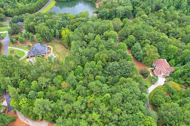Beautifully wooded, gently sloping lot-ideal for a basement on The Orchard Golf and Country Club in Georgia - for sale on GolfHomes.com, golf home, golf lot