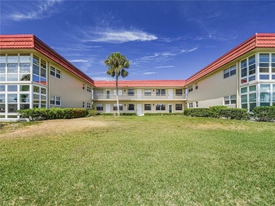 First Floor 1BDR/1BA condo with lake views in active 55+ on The American Golf Club in Florida - for sale on GolfHomes.com, golf home, golf lot