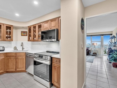 Super stylish kitchen with new quartz countertops, designer on Coral Ridge Country Club in Florida - for sale on GolfHomes.com, golf home, golf lot