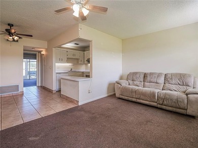 First Floor 1BDR/1BA condo with lake views in active 55+ on The American Golf Club in Florida - for sale on GolfHomes.com, golf home, golf lot