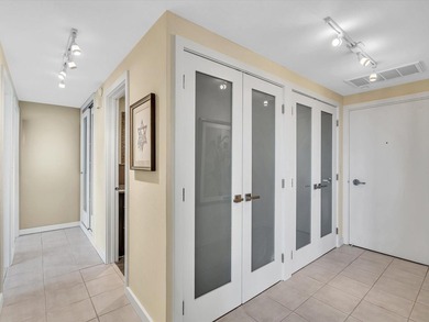 Super stylish kitchen with new quartz countertops, designer on Coral Ridge Country Club in Florida - for sale on GolfHomes.com, golf home, golf lot