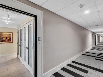 Super stylish kitchen with new quartz countertops, designer on Coral Ridge Country Club in Florida - for sale on GolfHomes.com, golf home, golf lot