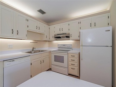 First Floor 1BDR/1BA condo with lake views in active 55+ on The American Golf Club in Florida - for sale on GolfHomes.com, golf home, golf lot