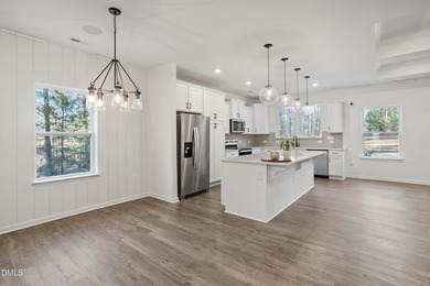 Welcome to 138 Sacred Fire Rd in the Lake Royale community of on River Golf and Country Club at Lake Royale in North Carolina - for sale on GolfHomes.com, golf home, golf lot