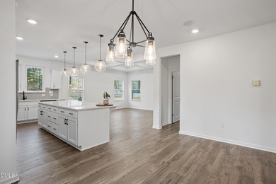 Welcome to 138 Sacred Fire Rd in the Lake Royale community of on River Golf and Country Club at Lake Royale in North Carolina - for sale on GolfHomes.com, golf home, golf lot