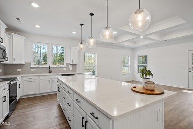 Welcome to 138 Sacred Fire Rd in the Lake Royale community of on River Golf and Country Club at Lake Royale in North Carolina - for sale on GolfHomes.com, golf home, golf lot