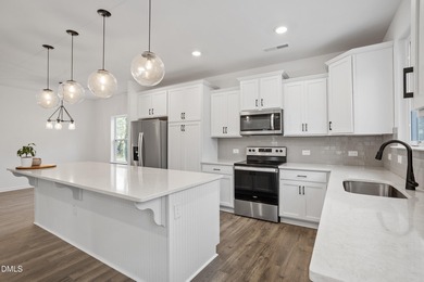 Welcome to 138 Sacred Fire Rd in the Lake Royale community of on River Golf and Country Club at Lake Royale in North Carolina - for sale on GolfHomes.com, golf home, golf lot