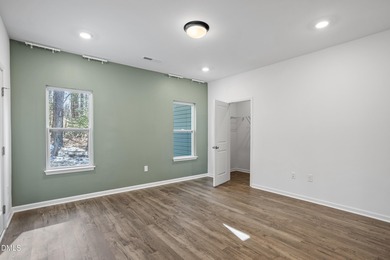 Welcome to 138 Sacred Fire Rd in the Lake Royale community of on River Golf and Country Club at Lake Royale in North Carolina - for sale on GolfHomes.com, golf home, golf lot