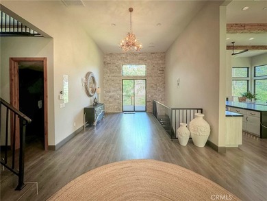 Step into a world of elegance and modern architecture with this on Big Bear Mountain Ski and Golf Resort in California - for sale on GolfHomes.com, golf home, golf lot