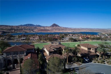 Prime elevated .43 acre lot with lake and mountain views from on South Shore At Lake Las Vegas in Nevada - for sale on GolfHomes.com, golf home, golf lot