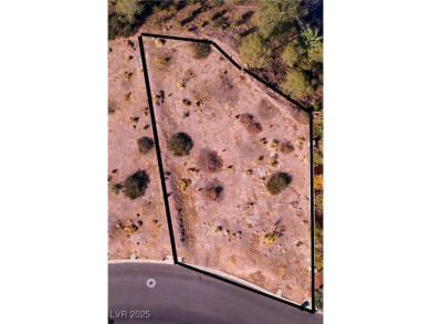 Prime elevated .43 acre lot with lake and mountain views from on South Shore At Lake Las Vegas in Nevada - for sale on GolfHomes.com, golf home, golf lot