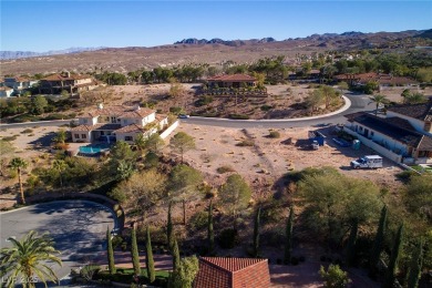 Prime elevated .43 acre lot with lake and mountain views from on South Shore At Lake Las Vegas in Nevada - for sale on GolfHomes.com, golf home, golf lot