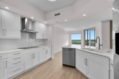 Step into this stunning 3-bedroom, 3.5-bath residence in Hammock on Hammock Bay in Florida - for sale on GolfHomes.com, golf home, golf lot