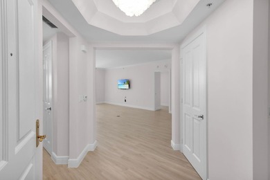 Step into this stunning 3-bedroom, 3.5-bath residence in Hammock on Hammock Bay in Florida - for sale on GolfHomes.com, golf home, golf lot