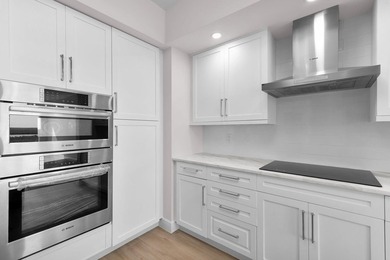 Step into this stunning 3-bedroom, 3.5-bath residence in Hammock on Hammock Bay in Florida - for sale on GolfHomes.com, golf home, golf lot