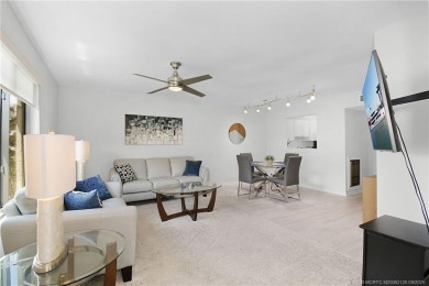 Peaceful and tranquil living comes to mind when you enter this on Miles Grant Country Club in Florida - for sale on GolfHomes.com, golf home, golf lot