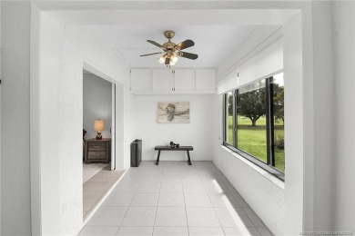 Peaceful and tranquil living comes to mind when you enter this on Miles Grant Country Club in Florida - for sale on GolfHomes.com, golf home, golf lot
