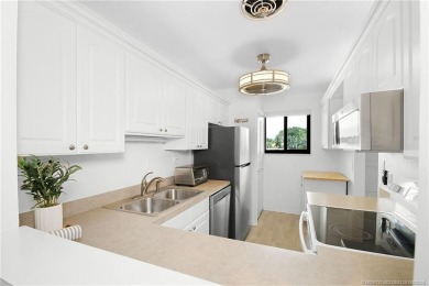 Peaceful and tranquil living comes to mind when you enter this on Miles Grant Country Club in Florida - for sale on GolfHomes.com, golf home, golf lot