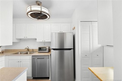 Peaceful and tranquil living comes to mind when you enter this on Miles Grant Country Club in Florida - for sale on GolfHomes.com, golf home, golf lot