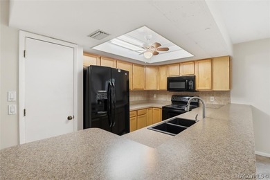 Nice and spacious three-bedroom, two-bath home ideally situated on Sugarmill Woods Golf and Country Club in Florida - for sale on GolfHomes.com, golf home, golf lot