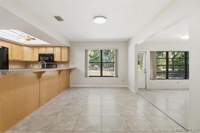 Nice and spacious three-bedroom, two-bath home ideally situated on Sugarmill Woods Golf and Country Club in Florida - for sale on GolfHomes.com, golf home, golf lot