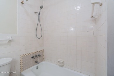 Come and see this beautiful lakefront one-level home on two on Lake Tansi Village Country Club in Tennessee - for sale on GolfHomes.com, golf home, golf lot