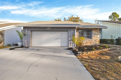 Updated and freshly painted cottage style home with 2 nice size on Sugarmill Woods Golf and Country Club in Florida - for sale on GolfHomes.com, golf home, golf lot