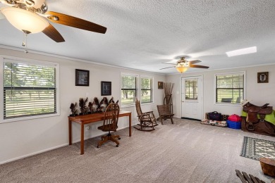 Positioned between the peaceful setting of Amon Carter Lake and on Twisted Oaks Golf Club in Texas - for sale on GolfHomes.com, golf home, golf lot