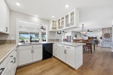 Located at the end of a quiet cul-de-sac on the 8th hole of the on Sun City Lakes West and East in Arizona - for sale on GolfHomes.com, golf home, golf lot