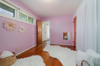 Nestled on a quiet street, this 3-bedroom, 1.5-bathroom  boasts on Twin Ponds Golf and Country Club in New York - for sale on GolfHomes.com, golf home, golf lot