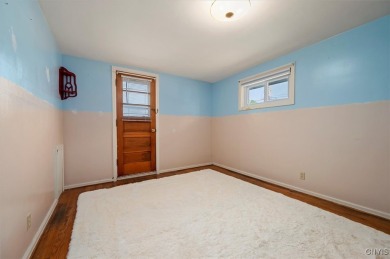 Nestled on a quiet street, this 3-bedroom, 1.5-bathroom  boasts on Twin Ponds Golf and Country Club in New York - for sale on GolfHomes.com, golf home, golf lot
