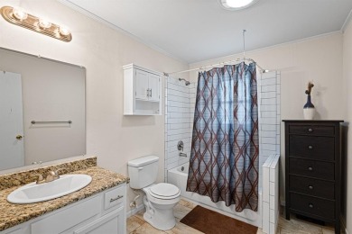 Positioned between the peaceful setting of Amon Carter Lake and on Twisted Oaks Golf Club in Texas - for sale on GolfHomes.com, golf home, golf lot