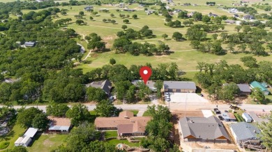 Positioned between the peaceful setting of Amon Carter Lake and on Twisted Oaks Golf Club in Texas - for sale on GolfHomes.com, golf home, golf lot