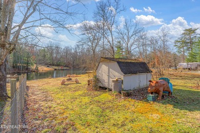 Come and see this beautiful lakefront one-level home on two on Lake Tansi Village Country Club in Tennessee - for sale on GolfHomes.com, golf home, golf lot