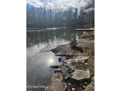 Come and see this beautiful lakefront one-level home on two on Lake Tansi Village Country Club in Tennessee - for sale on GolfHomes.com, golf home, golf lot