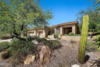 Nestled on a premium large lot adorned with lush landscaping on Anthem Golf and Country Club  in Arizona - for sale on GolfHomes.com, golf home, golf lot